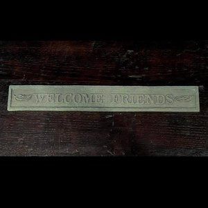 "Welcome Friends" sign